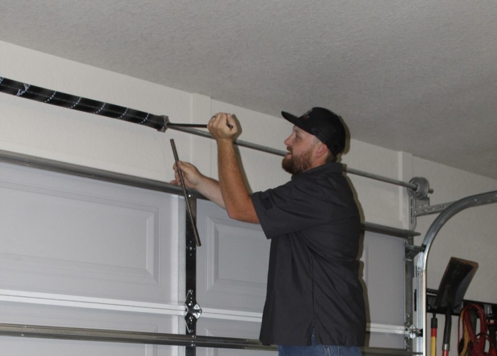 How a Broken Garage Door Spring Affects Your Entire Door System