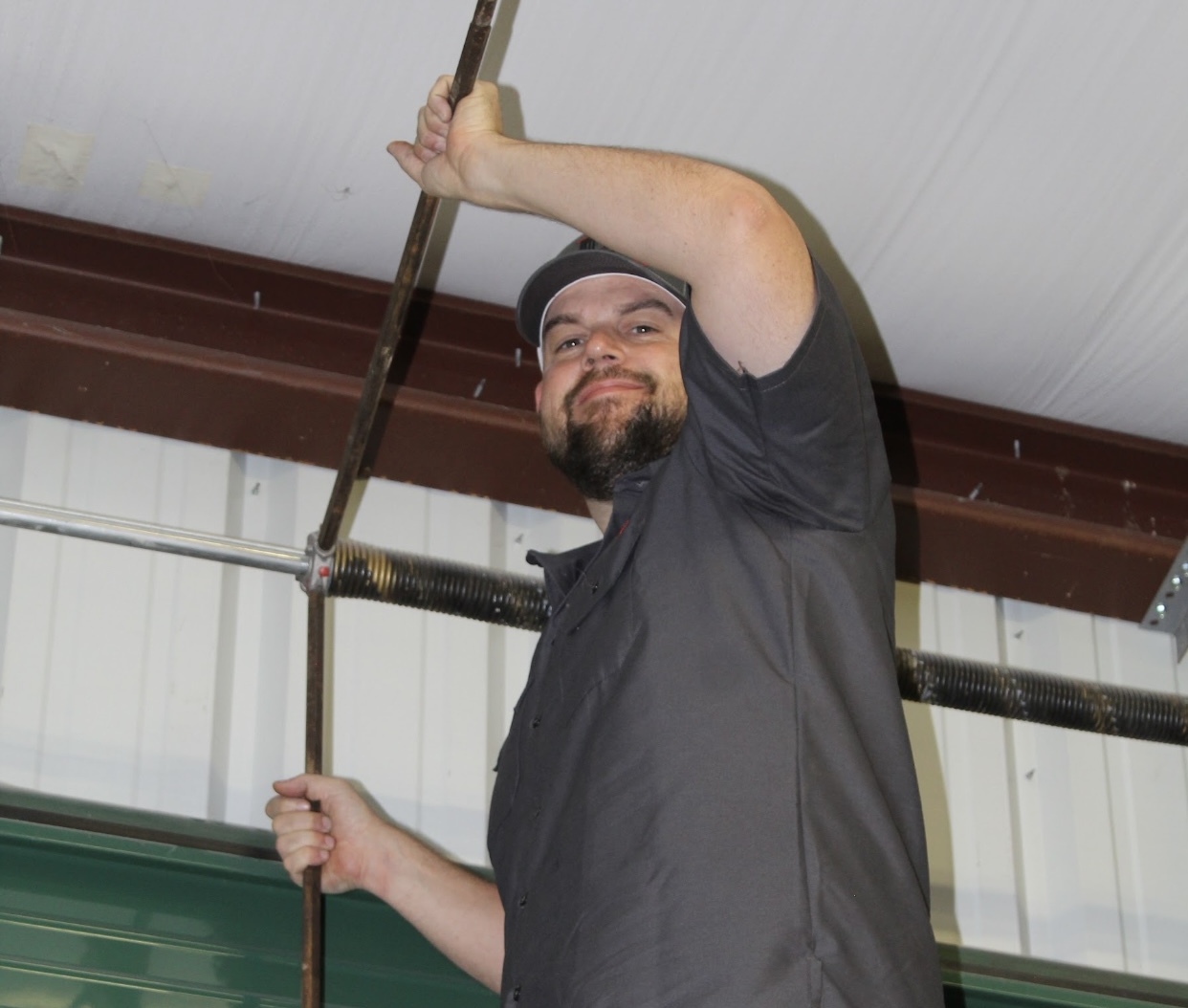 What Causes Garage Door Spring Repair Issues?